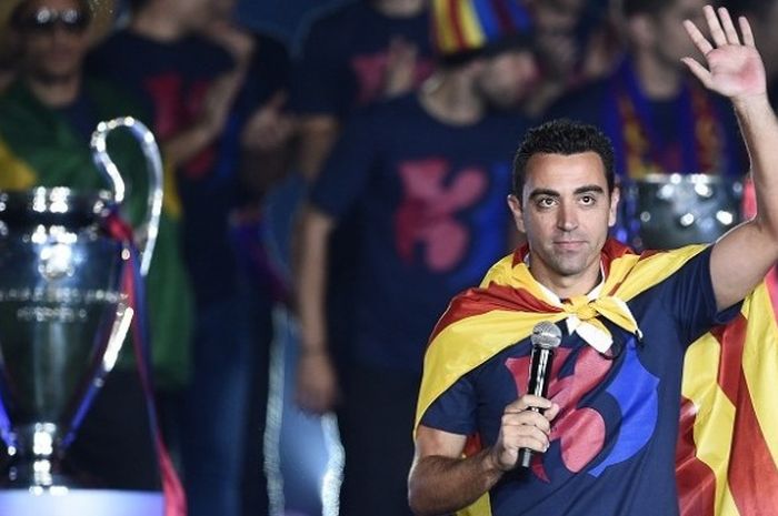 Xavi Hernandez kala merayakan keberhasilan Barcelona meraih gelar Liga Champions di Stadion Camp Nou, pada 7 Juni 2015. 