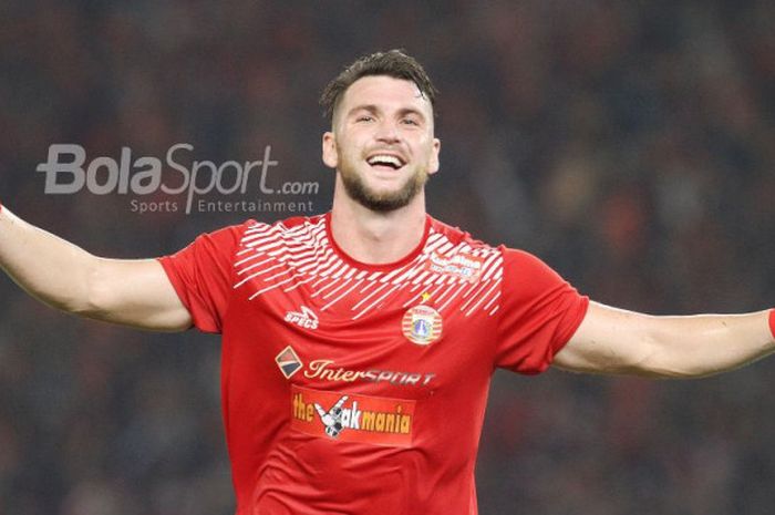     Striker Persija Jakarta, Marko Simic, merayakan gol ke gawang Bali United pada laga final Piala Presiden 2018 di Stadion Utama GBK pada Sabtu (17/2/2018).    