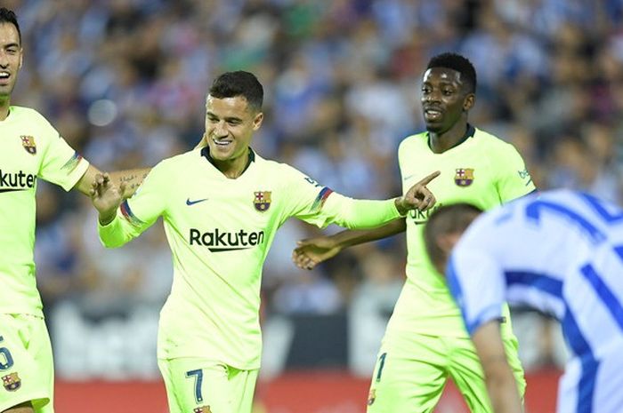 Gelandang FC Barcelona, Philippe Coutinho (kedua dari kiri), merayakan gol yang dicetak ke gawang Leganes dalam laga Liga Spanyol di Stadion Municipal de Butarque, Leganes, Spanyol pada 26 September 2018.