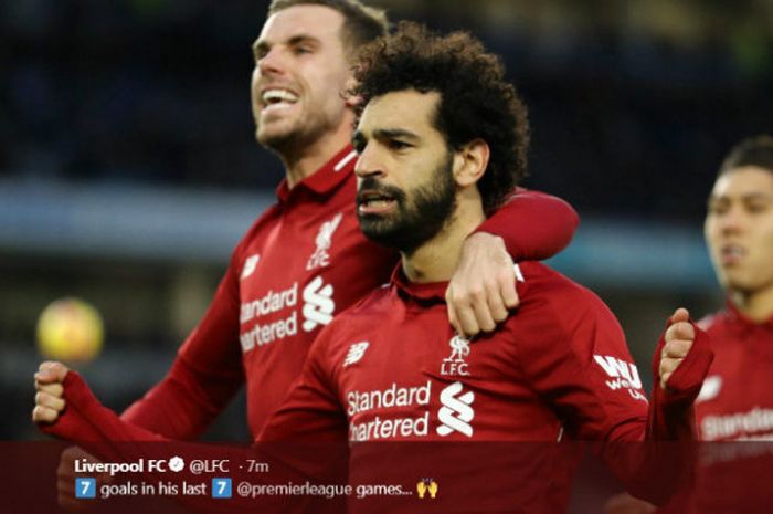 Penyerang Liverpool, Mohamed Salah, melakukan selebrasi seusai menjebol gawang Brighton and Hove Albion.