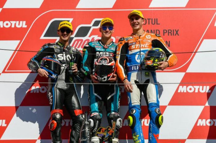 Pengisi podium Moto2 GP Jepang: Francesco Bagnaia (kiri), Fabio Quartararo (tengah), Lorenzo Baldassarri (kanan).