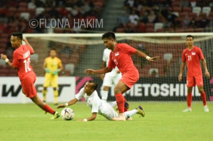 Pertandingan antara tim nasional Singapura dan Indonesia pada laga perdana Grup B Piala AFF 2018 di Stadion Nasional, Jumat (9/11/2018). 