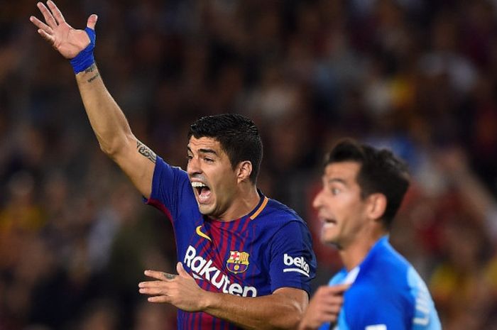 Ekspresi penyerang FC Barcelona, Luis Suarez, di laga lanjutan Liga Spanyol melawan Malaga di Camp Nou, Sabtu (21/10/2017) waktu setempat.