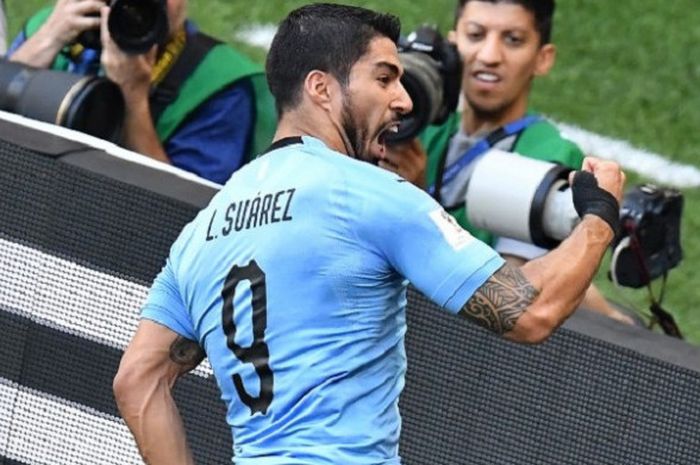 Penyerang Uruguay, Luis Suarez, merayakan golnya ke gawang Arab Saudi pada pertandingan Grup A Piala Dunia 2018 di Rostov Arena, 19 Juni 2018. 