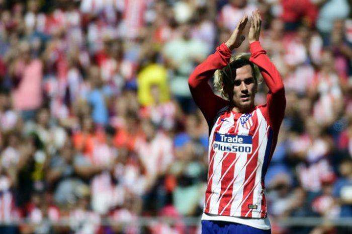  Penyerang Atletico Madrid, Antoine Griezmann, melakukan selebrasi seusai mencetak gol ke gawang Sevilla dalam laga di Wanda Metropolitano, 23 September 2017. 