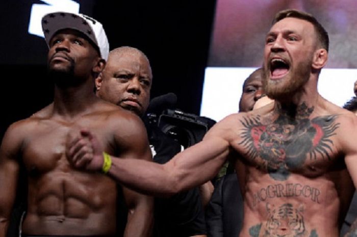 Perang urat syaraf sudah dilakukan Conor McGregor dan Floyd Mayweather pada acara timbang badan jelang pertarungan keduanya, Jumat (25/8/2017). 