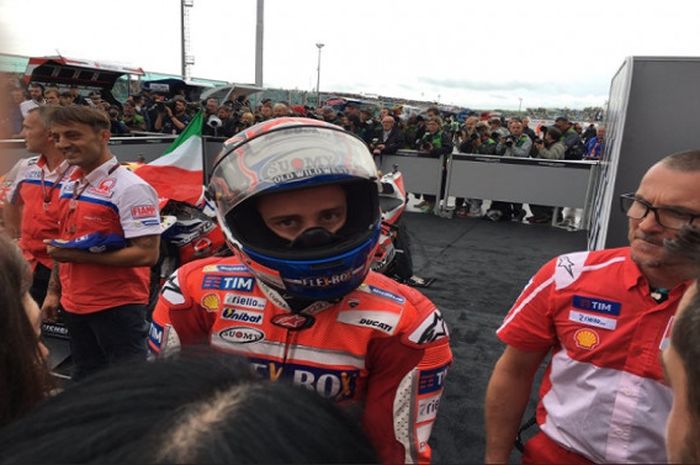 Andrea Dovizioso berhasil finis di posisi 3 pada ajang MotoGP San Marino yang digelar Minggu (10/9/2017)