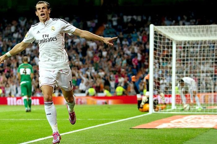 Winger Real Madrid, Gareth Bale, mencetak gol pembuka saat El Real menjamu Elche dalam pertandingan La Liga di Santiago Bernabeu, Madrid, 23 September 2014.