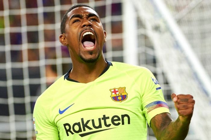 Penyerang Barcelona, Malcom, melakukan selebrasi seusai menjebol gawang AS Roma dalam laga ICC 2018 di AT&T Stadium, Selasa (31/7/2018).