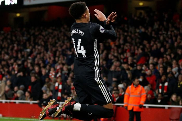 Pemain Manchester United, Jesse Lingard, merayakan gol yang dia cetak ke gawang Arsenal dalam laga Liga Inggris di Stadion Emirates, London, pada 2 Desember 2017.