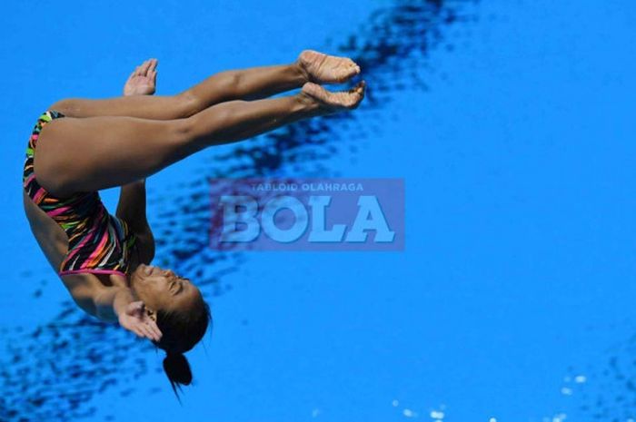 Aksi atlet lompat indah Indonesia, Eka Purnama Indah, pada Final Women's 1 meter Springboard di Stadion Akuatik Gelora Bung Karno, hari Jumat (31/8/2018).