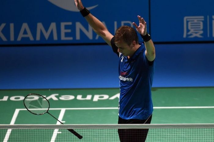 Pebulu tangkis tunggal putra Denmark, Hans-Kristian Vittinghus, melakukan selebrasi setelah memenang