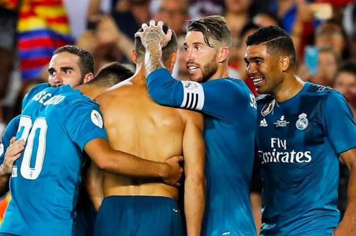 Cristiano Ronaldo berselebrasi saat berhasil membobol gawang Barcelona di menit ke-80.