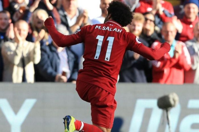 Mohamed Salah merayakan golnya untuk Liverpool FC ke gawang Brighton and Hove Albion dalam partai Liga Inggris di Anfield, Liverpool, 25 Agustus 2018.