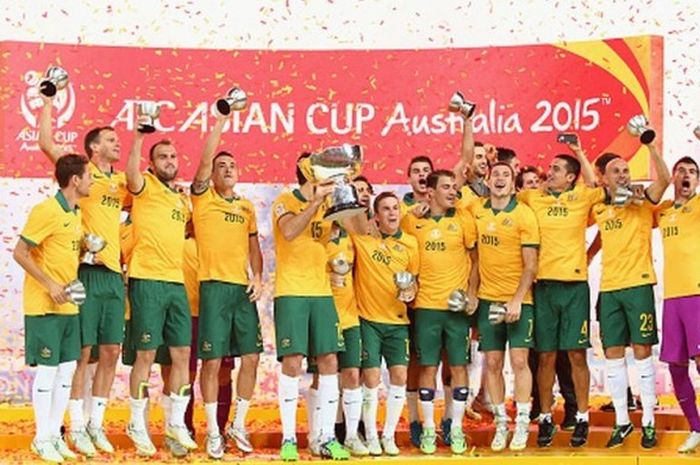 Pemain Australia merayakan kemenangan dalam final Piala Asia 2015 kontra Korea Selatan di Stadion ANZ, Sydney, Australia, 31 Januari 2015.