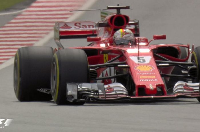 Pebalap Ferrari, Sebastian Vettel memimpin perolehan waktu lap tercepat di latihan bebas 2 GP Malaysia di Sirkuit Internasional Sepang, Jumat (29/9/2017).