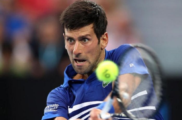 Petenis tunggal putra nomor satu dunia asal Serbia, Novak Djokovic, saat menjalani laga melawan Mitchell Krueger (Amerika Serikat) pada babak kesatu Australian Open 2019 di Rod Laver Arena, Melbourne Park, Australia, Selasa (15/1/2019). 