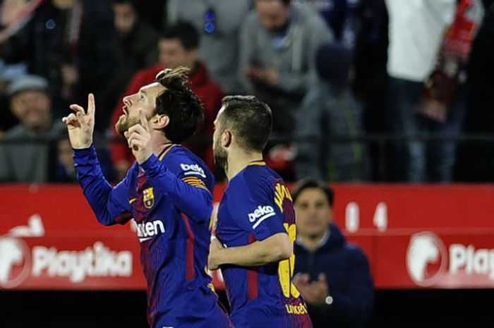Lionel Messi saat berselebrasi usai mencetak gol ke gawang Sevilla di Stadion Ramon Sanchez Pizjuan, pada Sabtu (31/3/2018) atau Minggu dini hari WIB.