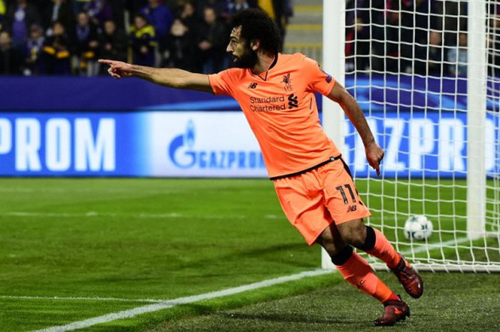  Selebrasi penyerang Liverpool, Mohamed Salah, setelah sukses mencetak gol ke gawang Maribor dalam lanjutan Grup E Liga Champions 2017-2018 di Stadion Ljudski vrt, Maribor, Slovenia, pada Selasa (17/10/2017). 