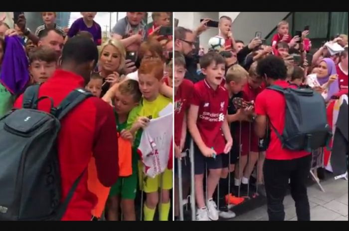Para pemain Liverpool beri tanda tangan kepada penggemar ketika tiba di Dublin, Prancis pada Sabtu (3/8/2018).