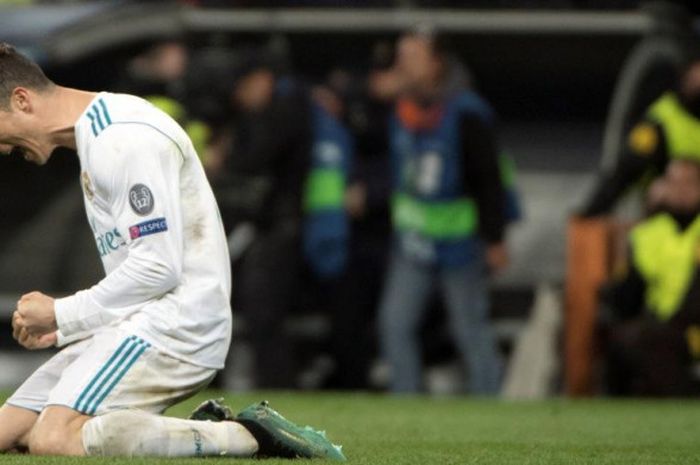  Cristiano Ronaldo merayakan kelolosan Real Madrid ke semifinal Liga Champions setelah menghadapi Juventus pada duel di Santiago Bernabeu, Madrid, 11 April 2018. 