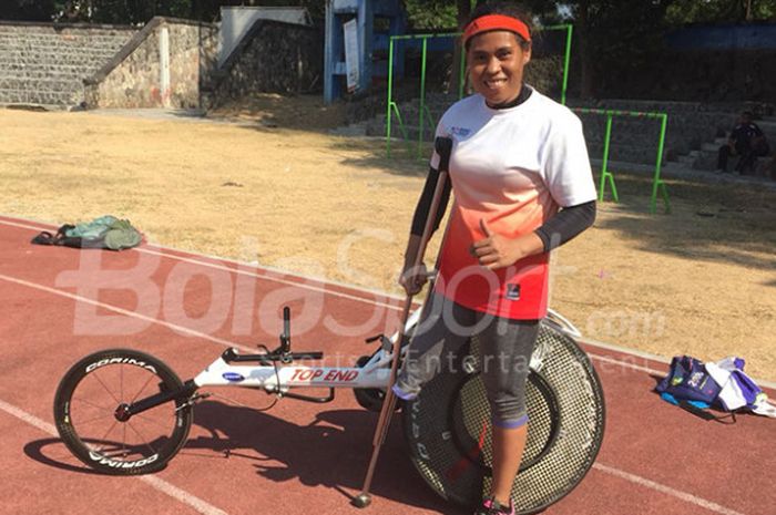 Sprinter kursi roda Indonesia, Maria Goreti Samiati, berlatih di Stadion Sriwedari, Solo, sebagai persiapan ke Asian Para Games 2018, Kamis (6/9/2018).