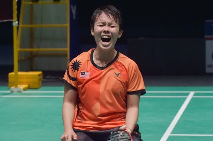  Pebulu tangkis tunggal putri Malaysia, Goh Jin Wei, bereaksi setelah memastikan medali emas SEA Gam
