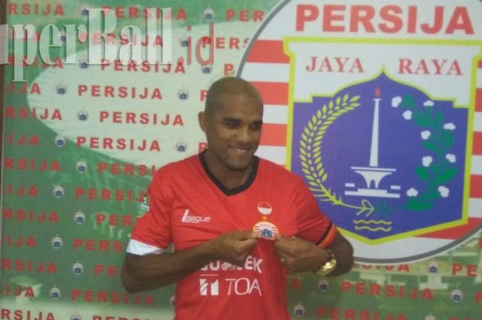 Reinaldo Elias da Costa mengenakan jersey Persija Jakarta