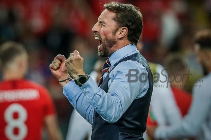   Pelatih timnas Inggris, Gareth Southgate, merayakan kesuksesan timnya lolos ke perempat final Piala Dunia 2018 usai menyingkirkan Kolombia pada laga babak 16 besar Piala Dunia di Stadion Spartak, Moskow, 3 Juli 2018.  