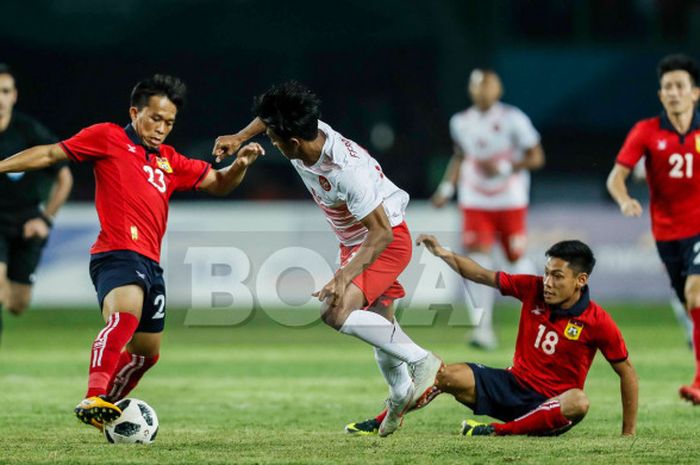 Gelandang tim nasional U-23 Indonesia, Febri Hariyadi, beraksi pada pertandingan lanjutan Grup A sepak bola Asian Games 2018 kontra Laos, di Stadion Patriot, Jumat (17/8/2018). 