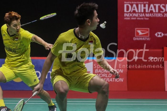 Pasangan ganda putra Indonesia, Marcus Fernaldi Gideon/Kevin Sanjaya Sukamuljo, pada final Indonesia Masters 2018 di Istora Senayan, Jakarta, Minggu (28/1/2018)