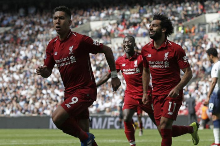 Pemain Liverpool, Roberto Firmino, melakukan selebrasi seusai menjebol gawnag Tottenham Hotspur dalam partai Liga Inggris di Stadion Wembley, Sabtu (15/9/2018)