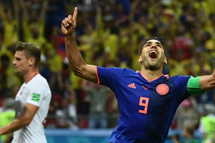 Penyerang Kolombia, Radamel Falcao, merayakan gol yang dicetak ke gawang Polandia dalam laga Grup H 