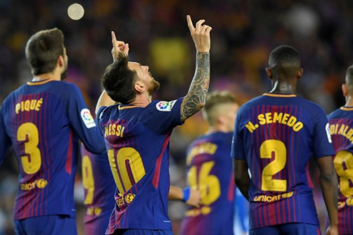 Megabintang FC Barcelona, Lionel Messi, merayakan gol yang dia cetak ke gawang Espanyol dalam laga Liga Spanyol di Stadion Camp Nou, Barcelona, pada 9 September 2017.