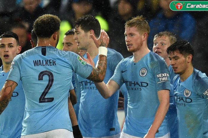 Manchester City, Kyle Walker, dkk berselebrasi dalam laga perempat final Piala Liga Inggris versus Leicester, Selasa (18/12/2018) di King Power Stadium, Leicester.