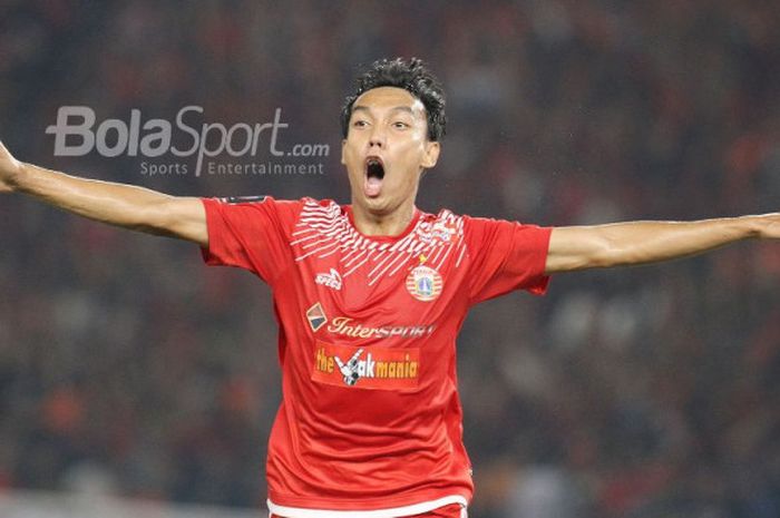 Pemain Persija, Novri Setiawan, merayakan gol ke gawang Bali United pada laga final Piala Presiden 2018 di Stadion Utama GBK pada Sabtu (17/2/2018).