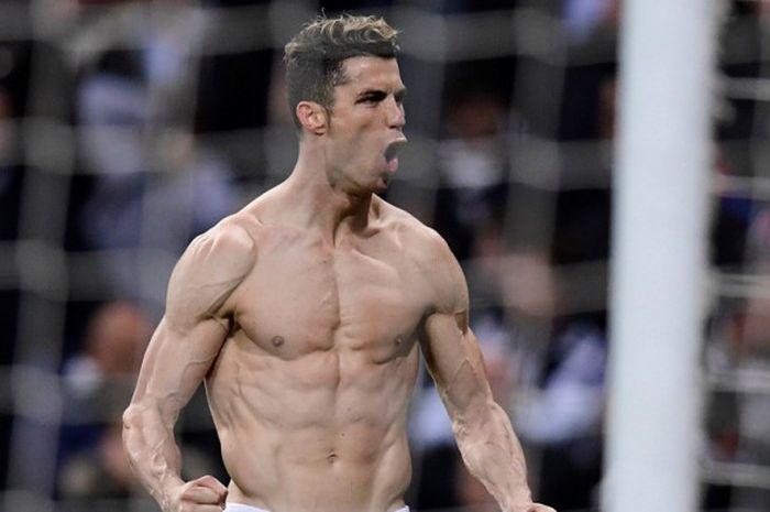        Megabintang Real Madrid, Cristiano Ronaldo, merayakan golnya dalam laga leg kedua perempat final Liga Champions kontra Juventus di Stadion Santiago Bernabeu, Madrid, Spanyol pada 11 April 2018.       