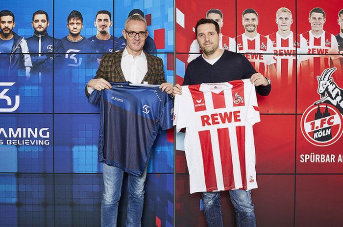 Managing Director FC Koeln, Alexander Wehrle (kiri), berpose dengan Managing Director SK Gaming, Alexander Mueller.