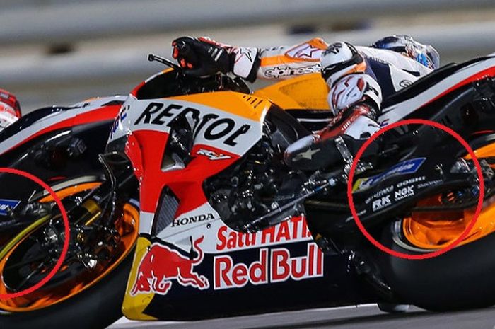 Marc Marquez dan Dani Pedrosa menggunakan swingarm karbon saat balapan MotoGP Qatar, Minggu (18/3/2018).