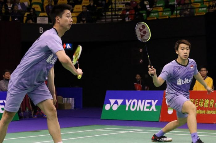 Pasangan ganda putra Indonesia, Marcus Fernaldi Gideon/Kevin Sanjaya Sukamuljo, saat menjalani laga melawan Ong Yew Sin/Tan Wee Kiong (Malaysia) pada babak perempat final turnamen Hong Kong Terbuka 2017 di Hong Kong Coliseum, Kowloon, Jumat (24/11/2017).