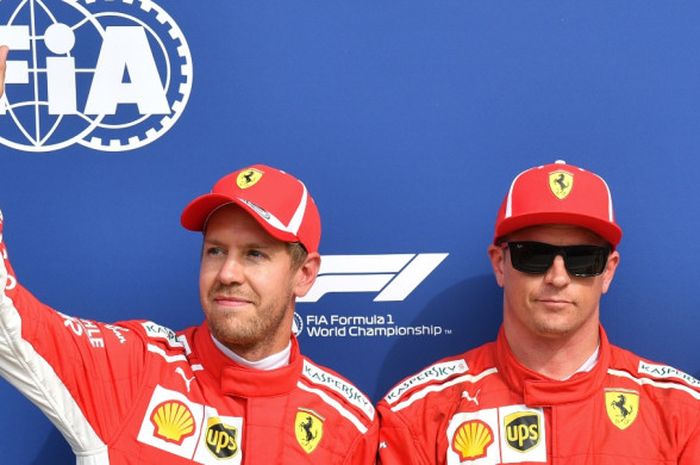 Dua pebalap Ferrari, Sebastian Vettel (kiri) dan Kimi Raikkonen, melakukan selebrasi setelah berhasil meraih posisi start balapan Formula 1 (F1) GP Italia 2018 di posisi 1-2.