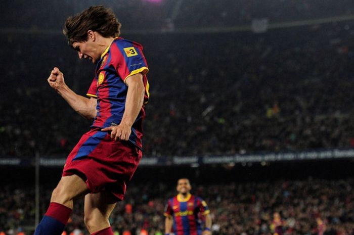 Penyerang FC Barcelona, Bojan Krkic, merayakan gol yang dicetak ke gawang Getafe dalam laga Liga Spanyol di Stadion Camp Nou, Barcelona pada 19 Maret 2011.