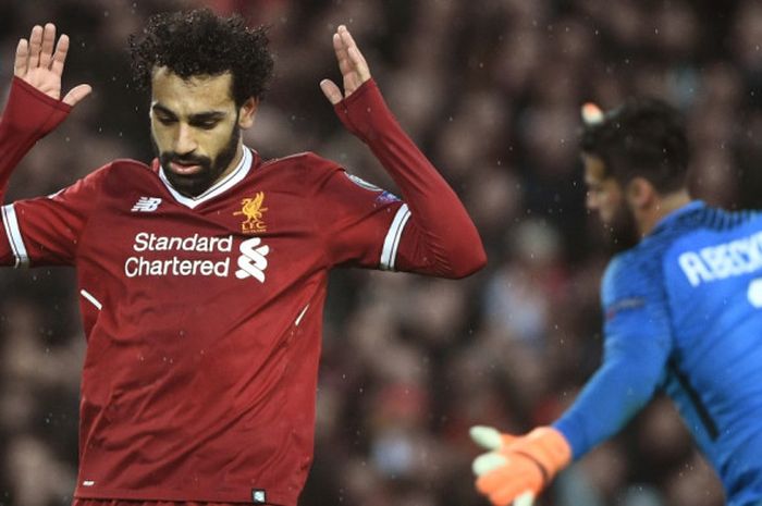 Pemain sayap Liverpool, Mohamed Salah, menolak melakukan selebrasi setelah mencetak gol ke gawang AS Roma pada laga leg pertama semifinal Liga Champions di Stadion Anfield, Selasa (24/4/2018) waktu setempat.