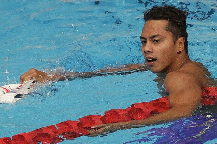 Perenang nasional, I Gede Siman Sudartawa, bereaksi setelah finis pertama pada nomor 50 meter gaya punggung SEA Games 2017 yang berlangsung di National Aquatic Centre, KL Sports, Bukit Jalil, Senin (21/8/2017).