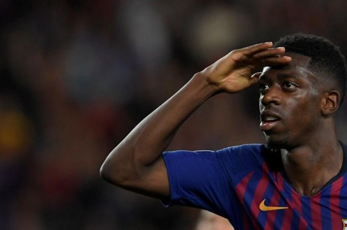  Ousmane Dembele merayakan golnya untuk FC Barcelona ke gawang PSV Eindhoven dalam partai Liga Champions di Camp Nou, Barcelona, 18 September 2018. 