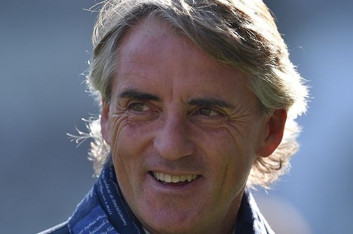 Pelatih Inter Milan, Roberto Mancini, tersenyum saat laga kontra Torino di Stadion Olimpico , Turin, 8 November 2015.