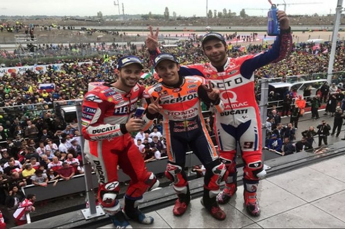 (dari ki-ka) Andrea Dovizioso, Marc Marquez, dan Danilo Petrucci berhasil menempati posisi podium pada ajang MotoGP seri San Marino yang digelar Minggu (10/9/2017).