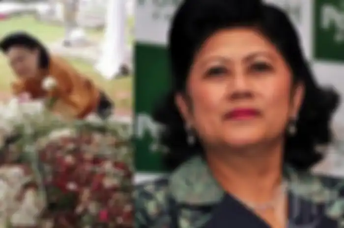 Saat itu ada seorang wanita yang meneteskan air mata sambil memegang gundukan tanah makam Ani Yudhoyono.