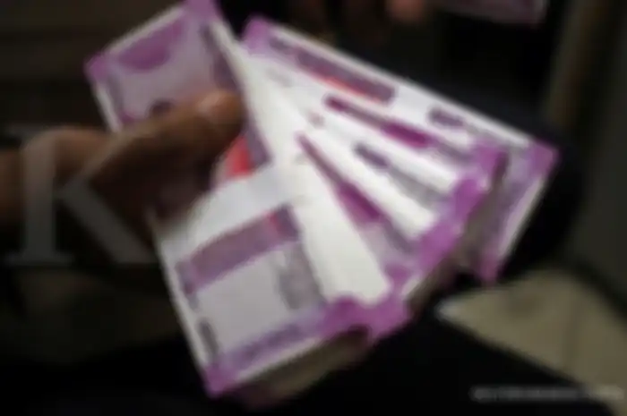 Rupee, mata uang India.