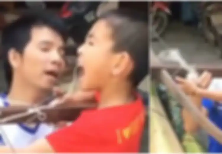 Cerdik, Ayah Ini Cabut Gigi Anaknya Pakai Busur Panah, Bisa Ditiru!